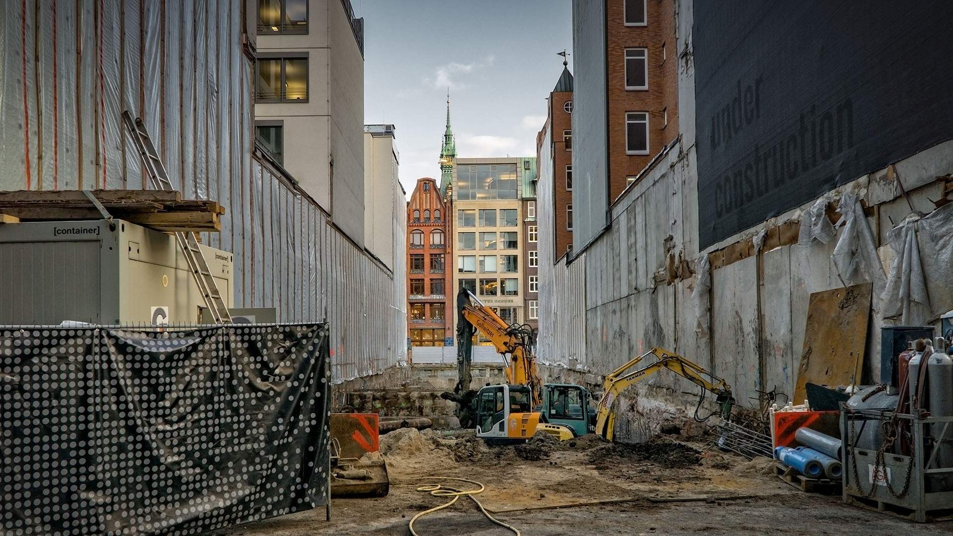 https://www.pexels.com/photo/yellow-and-black-excavator-69483/